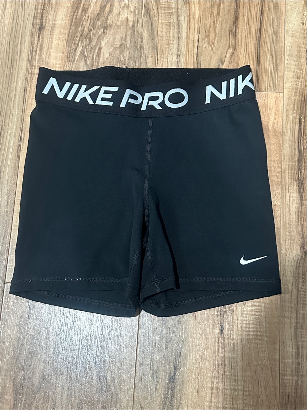 Women's Size Medium Nike Black Compression Bike Shorts with White Swoosh